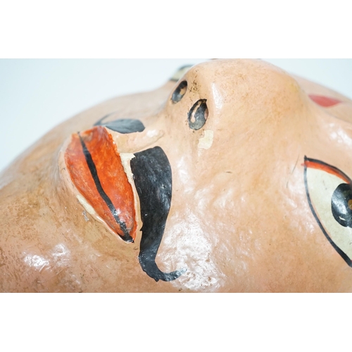 341 - A papier mache wall mask of an Indian gentleman 32cm long