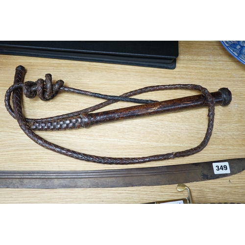 349 - An Ottoman tulwar sabre, a European sabre and a leather whip