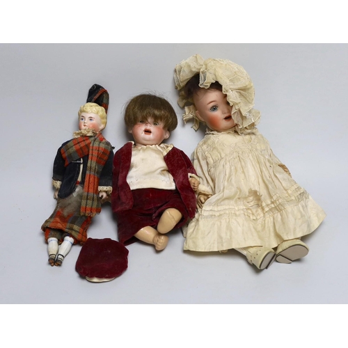 358 - A German bent limb doll, face cracked H12in. German bent limb character baby doll H9in. bisque head ... 