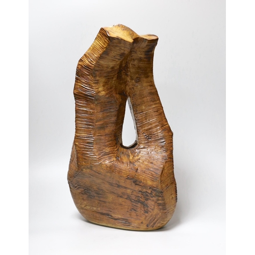 363 - Ruth Sulke - a large brown copper glazed stoneware angular wooden sculpture with central hole, 198... 