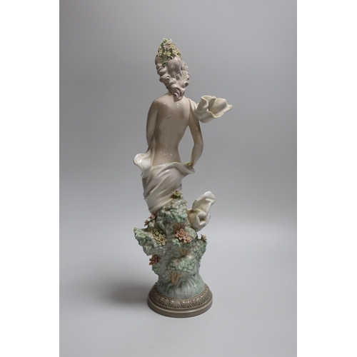 376 - A Lladro figure of a maiden, decorators signature on base, No 40141 cms.