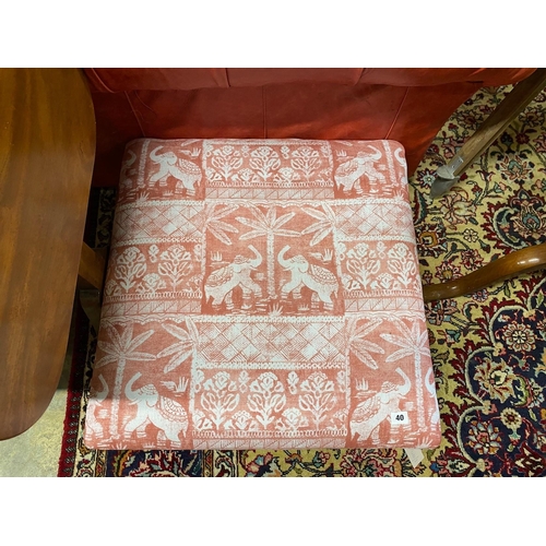 40 - A reproduction Victorian style mahogany footstool upholstered in Jane Churchill 'Elephant Parade' fa... 