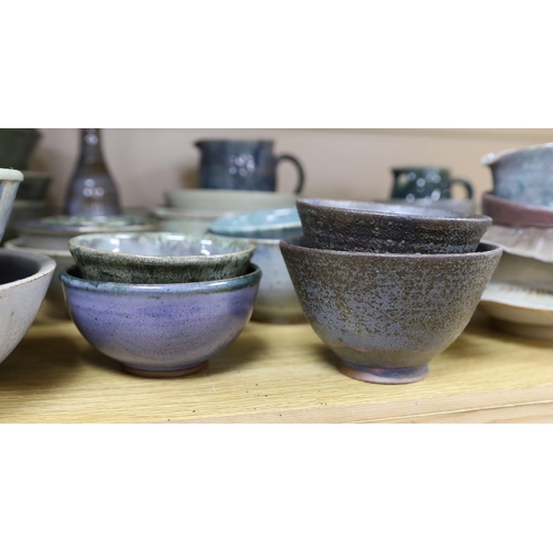 403 - A collection of studio pottery bowls jugs and dishes