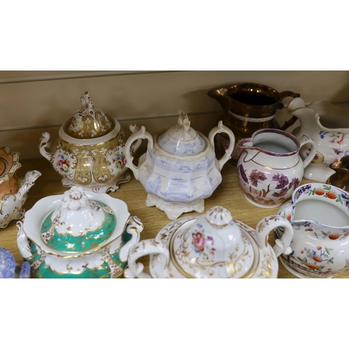 412 - A collection of Victorian porcelain and pottery sucriers and jugs