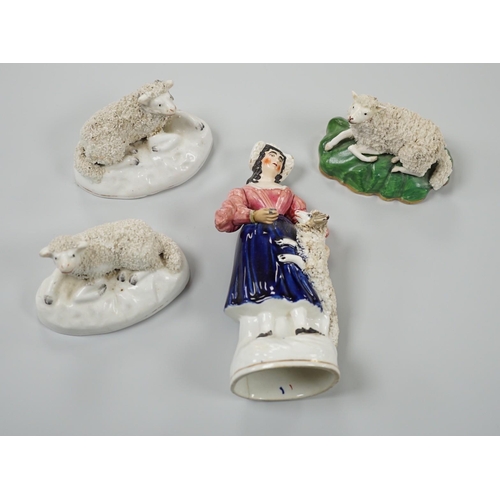 417 - Three small Staffordshire models of recumbent sheep on oval mounted bases, together with a Staffords... 