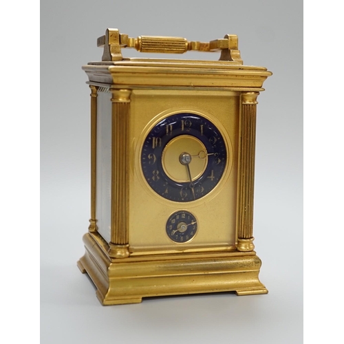 420 - A 19th century French brass eight day carriage clock with alarm,. 12cm tall