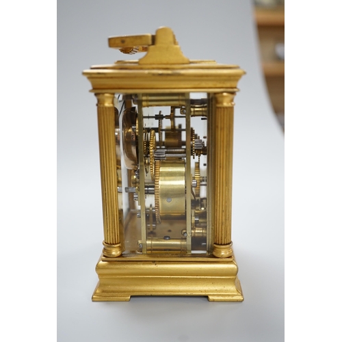 420 - A 19th century French brass eight day carriage clock with alarm,. 12cm tall