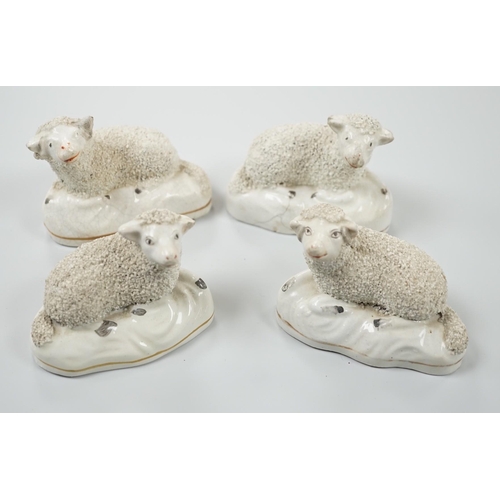 423 - Four small Staffordshire models of recumbent sheep, c.1830-50. 8.5cm longProvenance: Dennis G.Rice c... 