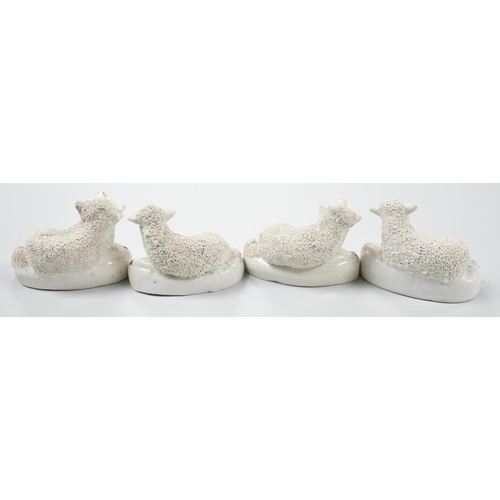 423 - Four small Staffordshire models of recumbent sheep, c.1830-50. 8.5cm longProvenance: Dennis G.Rice c... 