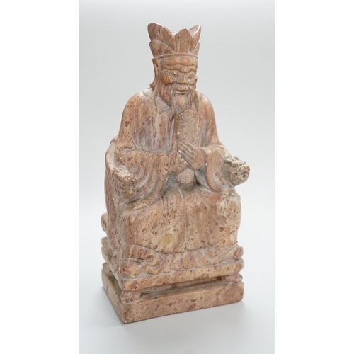 430 - A Chinese soapstone seated figure of an Emperor, 19cm tall