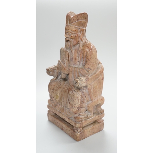 430 - A Chinese soapstone seated figure of an Emperor, 19cm tall