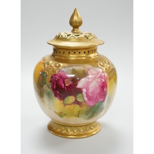 432 - A Royal Worcester pink rose painted pot pourri vase and cover. 14cm tall