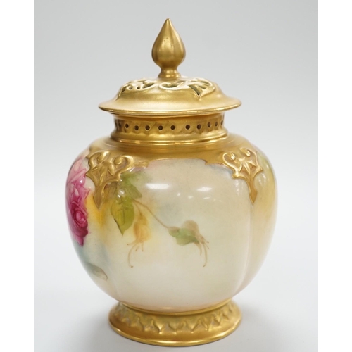 432 - A Royal Worcester pink rose painted pot pourri vase and cover. 14cm tall