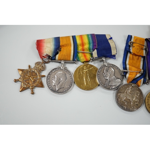 443 - A WWI naval medal group of four with portrait photo with records and one other WWI trio