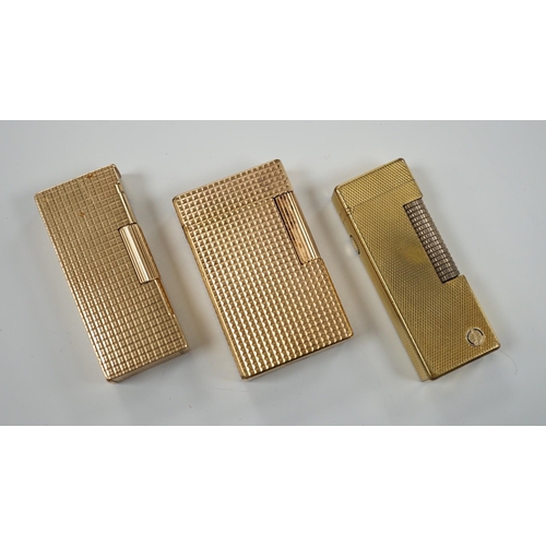 450 - Three Dupont gilt metal lighters