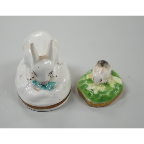 451 - Two toy Staffordshire models of a recumbent rabbit and a bunny, both on oval bases, c.1830-50, (2). ... 