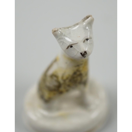 455 - A seated toy Staffordshire model of a cat with tortoiseshell markings, c.1830-50. 4.5cm tallProvenan... 