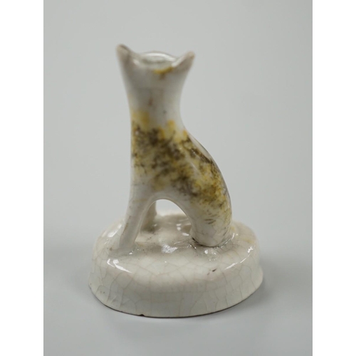 455 - A seated toy Staffordshire model of a cat with tortoiseshell markings, c.1830-50. 4.5cm tallProvenan... 