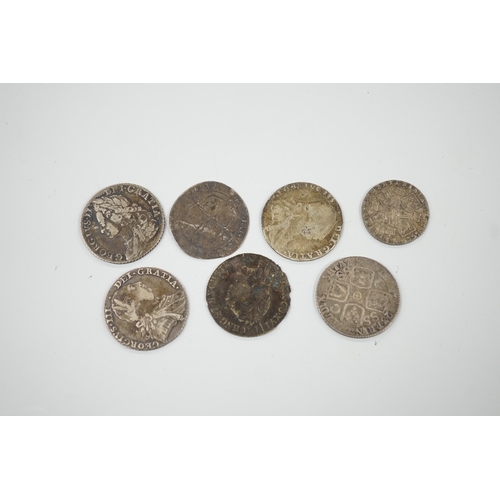 470 - Four 18th century shillings, a sixpence an Elizabeth I coin and a token