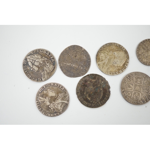 470 - Four 18th century shillings, a sixpence an Elizabeth I coin and a token