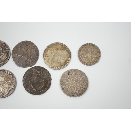 470 - Four 18th century shillings, a sixpence an Elizabeth I coin and a token