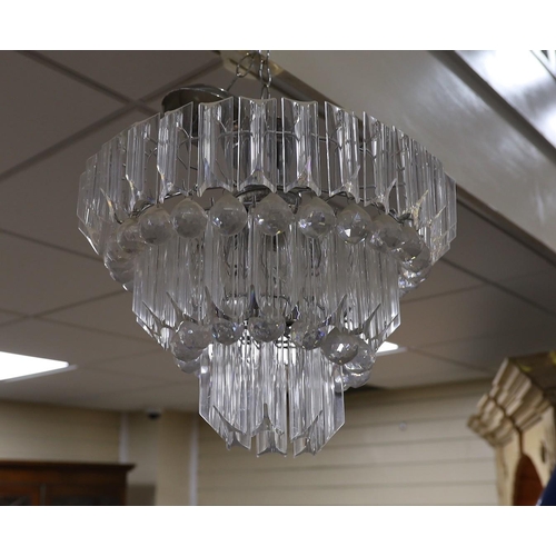 503 - A perspex three tier chandelier