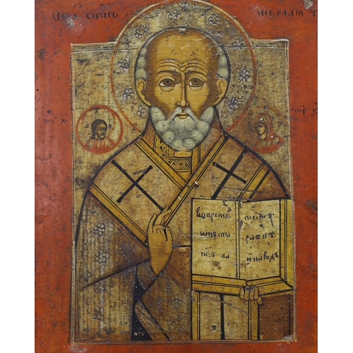 694 - 19th century South Russian School, tempera on wooden panel, Icon of St. Nicholas holding the scriptu... 