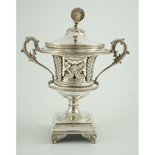 800 - A 19th century ornate French pierced silver two handled urn shaped vase and cover, with peacock fini... 