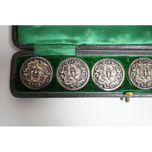 803 - A cased set of six Edwardian silver buttons, each embossed with a mask, Henry Matthews, Birmingham, ... 