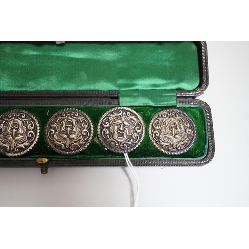 803 - A cased set of six Edwardian silver buttons, each embossed with a mask, Henry Matthews, Birmingham, ... 