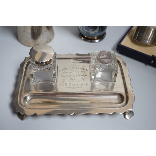 809 - A group of silver including a George V silver inkstand, 17.7cm, a cased pair of napkin rings and two... 