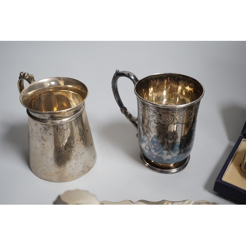 809 - A group of silver including a George V silver inkstand, 17.7cm, a cased pair of napkin rings and two... 