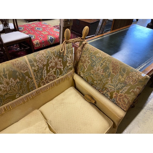 83 - A Knole settee, upholstered in floral brocade, width 186cm, depth 80cm, height 104cm.