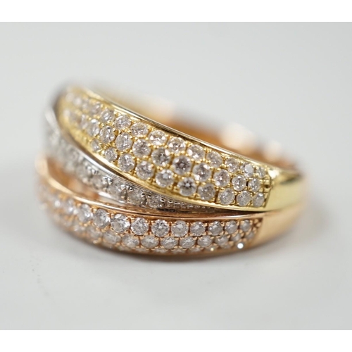 882 - A modern three colour 18ct gold and diamond chip cluster set three row crossover ring, size O, gross... 