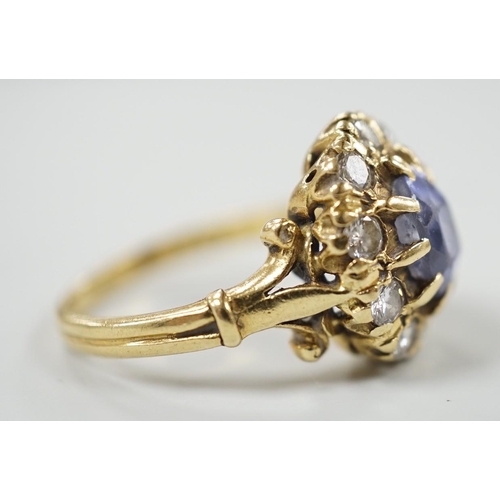 883 - An early to mid 20th century yellow metal, sapphire and diamond set oval cluster dress ring, size... 