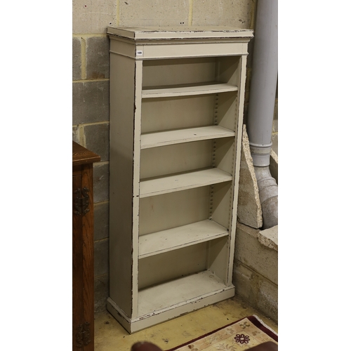 109 - A late 19th century Continental painted open bookcase, length 75cm, depth 27cm, height 164cm