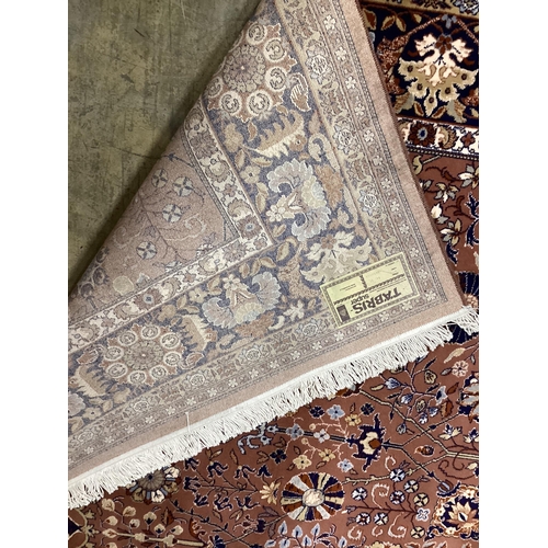 1027 - A modern Tabriz style peach ground carpet, approx. 400 x 300cm