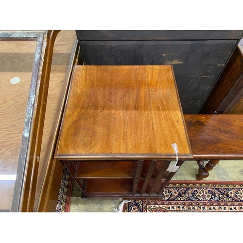 1041 - An Edwardian mahogany revolving bookcase, width 49cm, depth 49cm, height 87cm