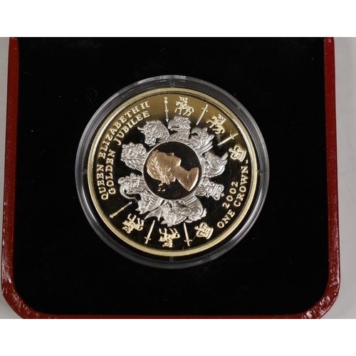 1521 - A cased Pobjoy mint tri-gold golden jubilee 1 crown coin, 2002, no. 483/999