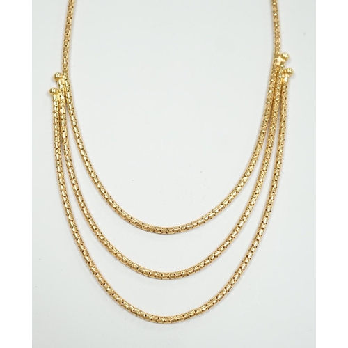 1889 - A modern 18ct gold three strand necklace, 43cm, 15.5 grams.