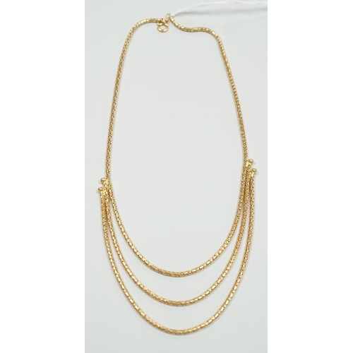 1889 - A modern 18ct gold three strand necklace, 43cm, 15.5 grams.