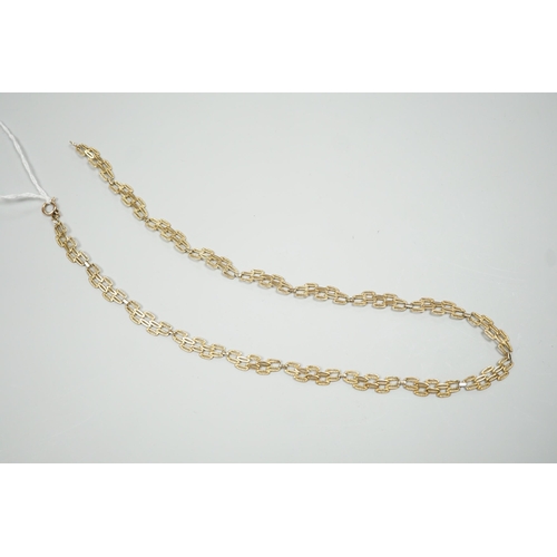 1890 - A 9ct gold pierced fancy link necklace, 45cm, 11 grams.