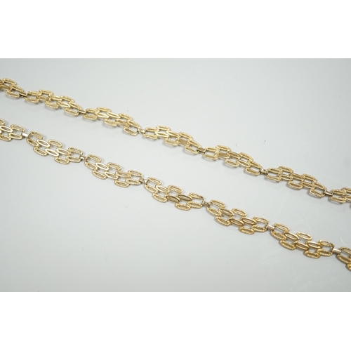 1890 - A 9ct gold pierced fancy link necklace, 45cm, 11 grams.