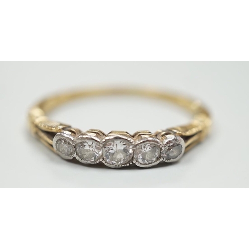 1891 - A yellow metal and graduated collet set five stone diamond ring, size N, gross weight 2.2 grams.... 