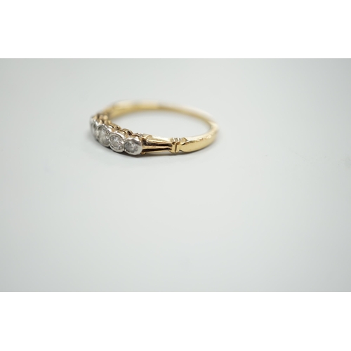 1891 - A yellow metal and graduated collet set five stone diamond ring, size N, gross weight 2.2 grams.... 