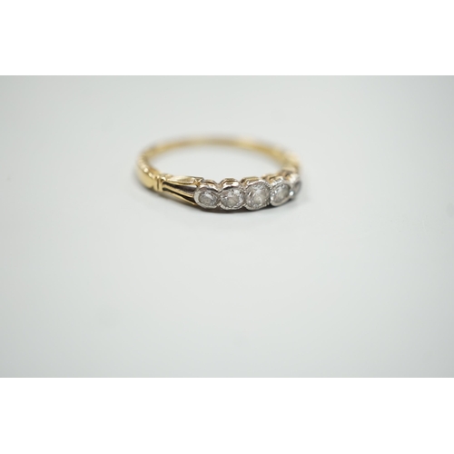 1891 - A yellow metal and graduated collet set five stone diamond ring, size N, gross weight 2.2 grams.... 