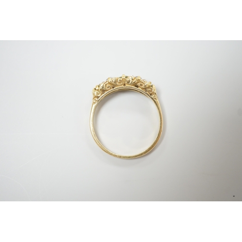 1892 - An 18ct, three stone peridot and two stone diamond set half hoop ring. size N, gross weight 2.6 gram... 