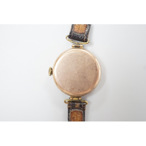 1893 - A lady's early 20th century 9ct gold wrist watch, with Arabic dial and RolWatchCo (Wilsdorf & Davis)... 