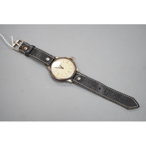 1896 - A Kriegsmarine style gun metal manual wind wrist watch, converted from a pocket watch, with later ad... 