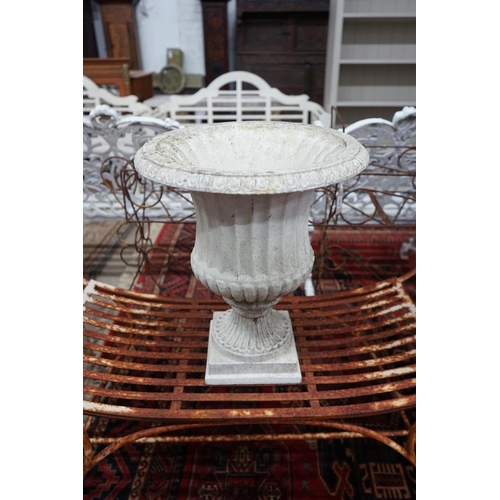 1075 - A Victorian earthenware campana garden urn on a plinth base, diameter 64cm, height 90cm